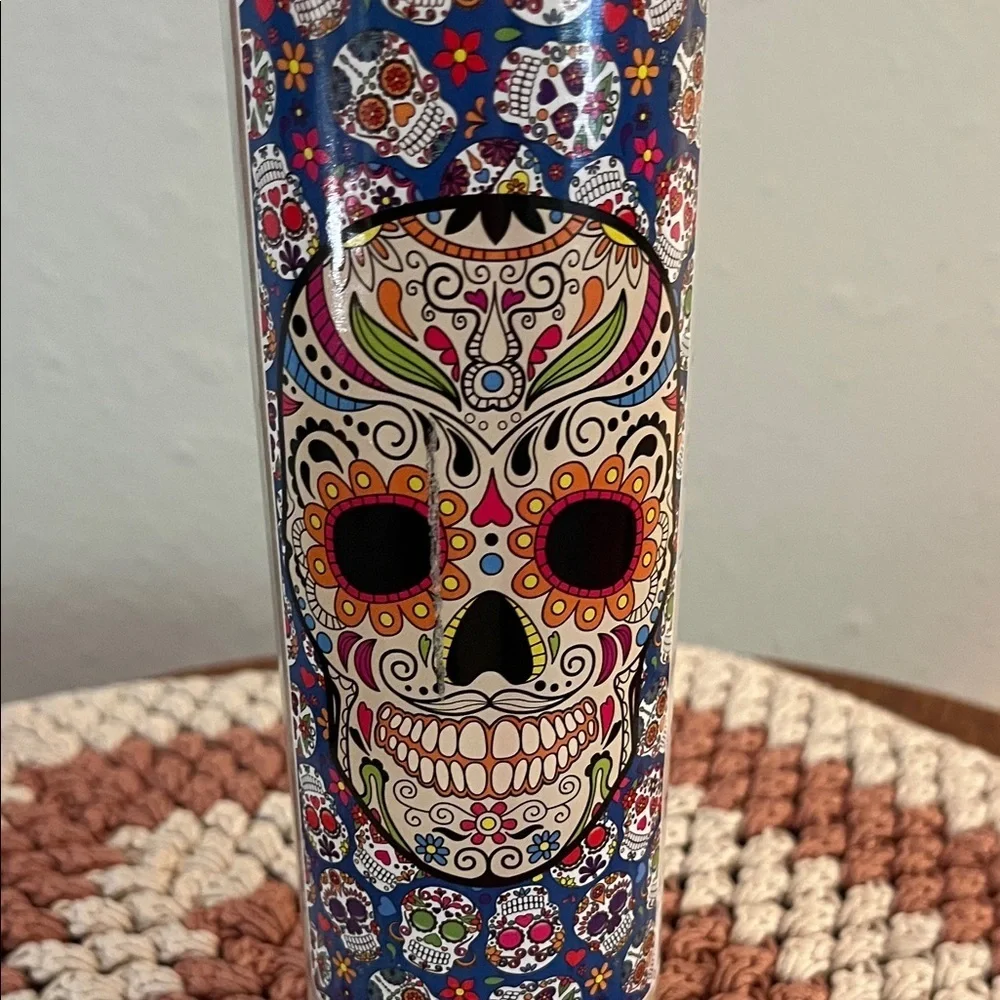 Vibrant Sugar Skull Candle with Blue Floral Design
